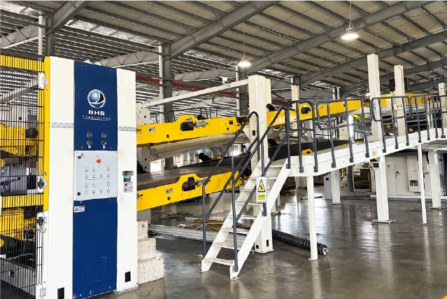 High-speed industrial packaging machine for efficient box manufacturing and fulfillment services.