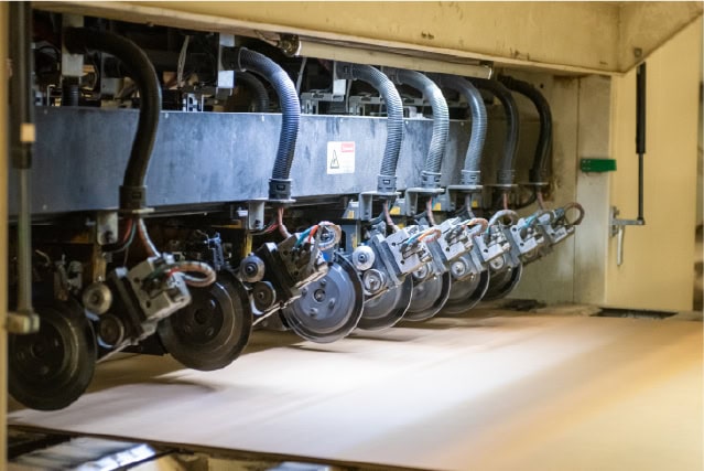 High-speed packaging machinery for efficient product packing at SC PACK BOX facility.